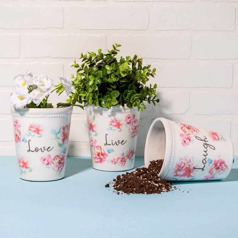 SET OF THREE (3) FLORAL PLANTERS